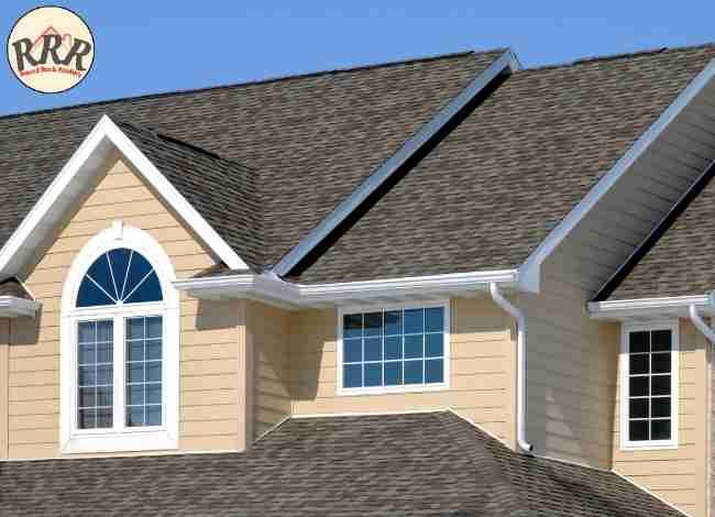 Asphalt shingle roof showing visible wear signs